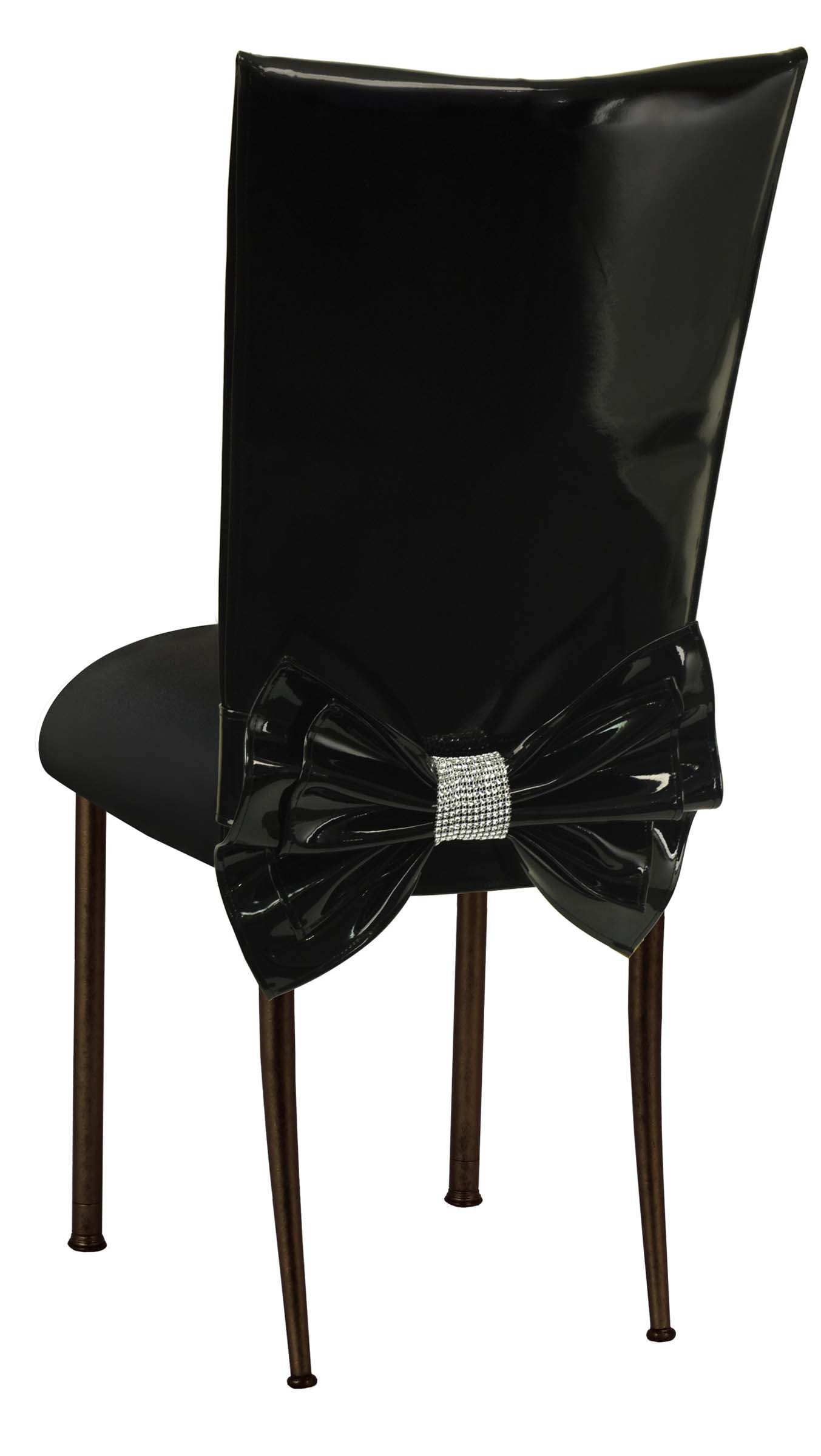 Black Patent Leather Chair Cover with Rhinestone Bow and Black Stretch Knit Cushion on Black Legs – Chameleon Chair Collection | Rental